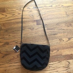 Mycra Pac Now crossbody black bag chevron pattern